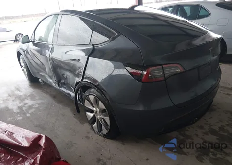2023 Tesla Model Y Awd/Long Range Dual Motor All-Wheel Drive z USA, uszkodzony, nr VIN 7SAYGDEE6PA040329